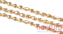 KORALIKI KRYSZTAŁOWE KROPLA FASETOWANA 5x4MM KOLOR CHAMPAGNE